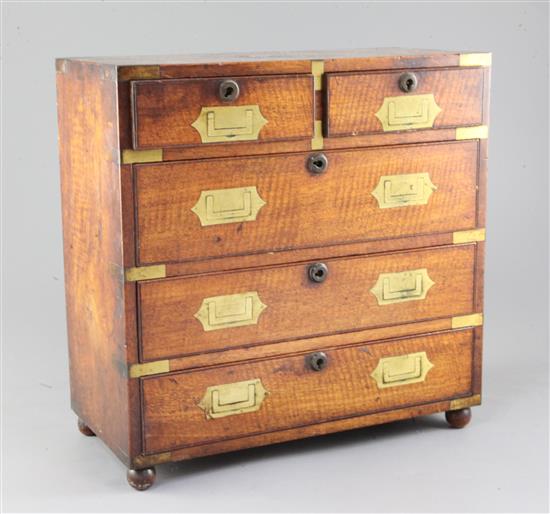 A Regency miniature brass inset mahogany campaign chest, width 12.5in. depth 6in. height 12.5in.